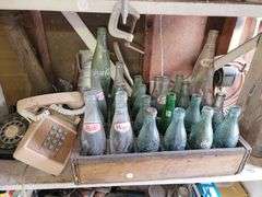 Old Coca Cola bottles from local jurisdictions, old phones and more