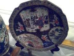 Asian styled decorative plate and vase