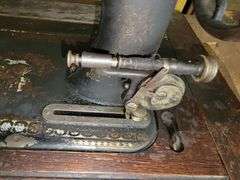 Antique New Home Sewing Machine and Cabinet