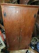 Solid wood corner cabinet.