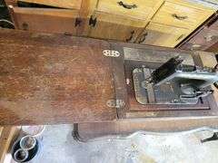 Antique New Home Sewing Machine and Cabinet