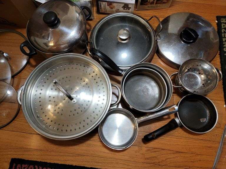 COLLECTION OF STAINLESS STEEL POTS AND PANS