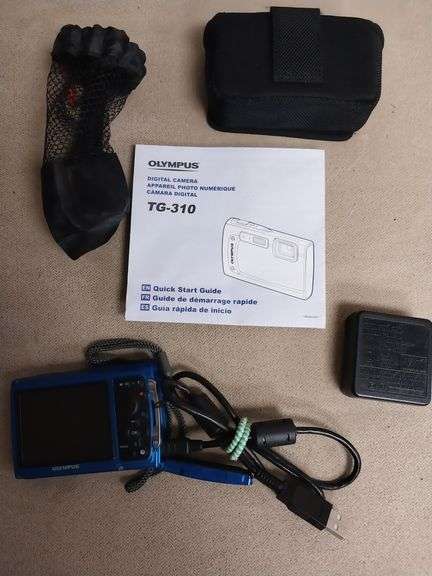 Olympus TG-310 Waterproof Digital Camera, works