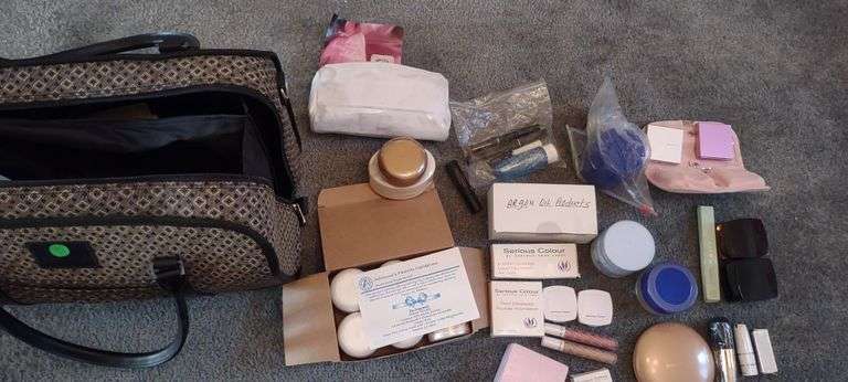 Travel Bag with numerous unopened skin care and makeup products