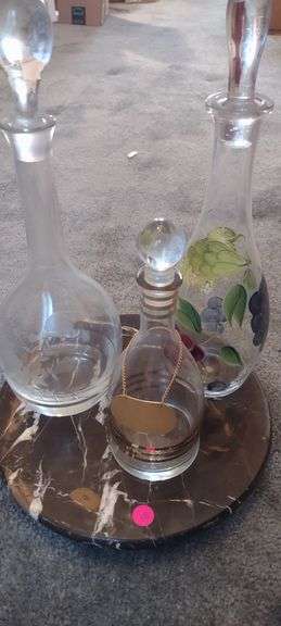 Beautiful Liquor Decanters on a marble rotating stand