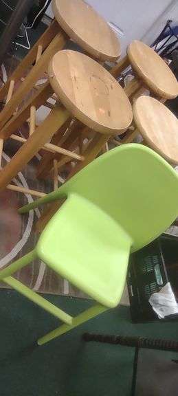 4 Wooden Stools, and 1 Green Plastic one