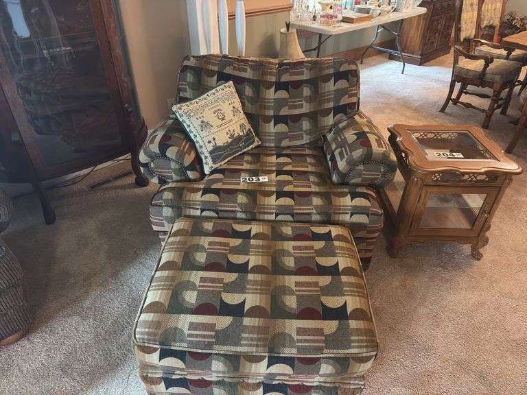 Large accent chair with ottoman and pillow ￼