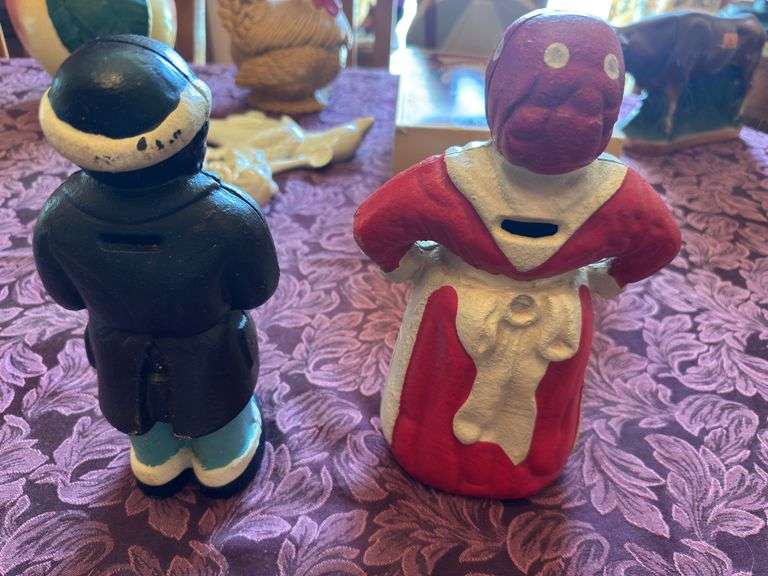 Pair of antique Aunt Jemima coin banks cast iron