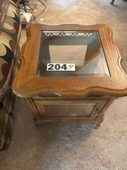Wood side table with glass top, glass doors, and glass shelf ￼