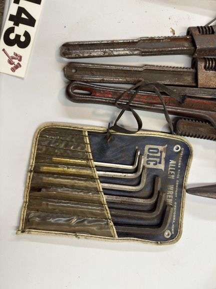 Pipe wrenches, pro bars, drill bits, large Allen wrenches box, cutters