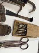 Pipe wrenches, pro bars, drill bits, large Allen wrenches box, cutters