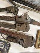 Pipe wrenches, pro bars, drill bits, large Allen wrenches box, cutters