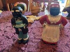 Pair of antique Aunt Jemima coin banks cast iron