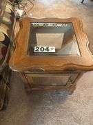 Wood side table with glass top, glass doors, and glass shelf ￼