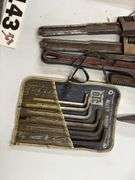 Pipe wrenches, pro bars, drill bits, large Allen wrenches box, cutters