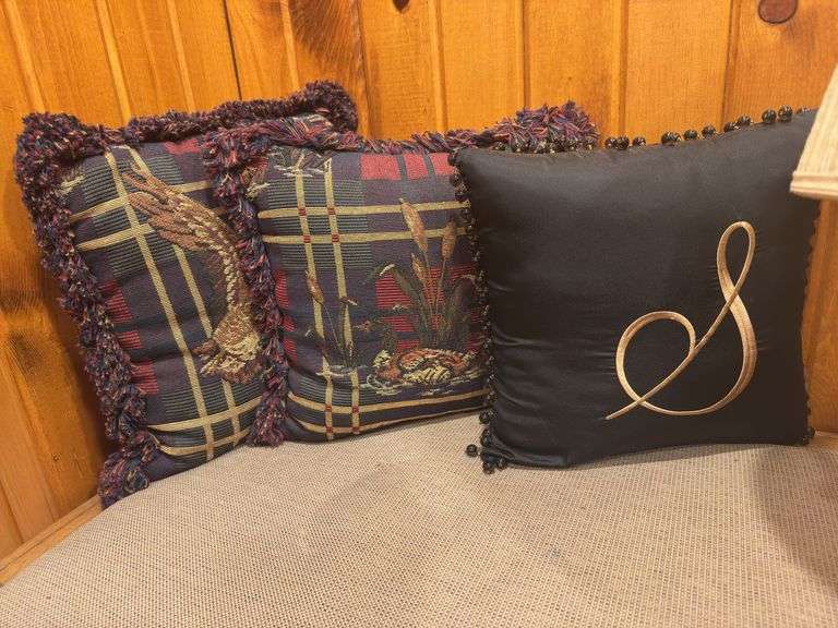 Wood bench with cushion seat, three wicker baskets, three lamps, two throw pillows ￼