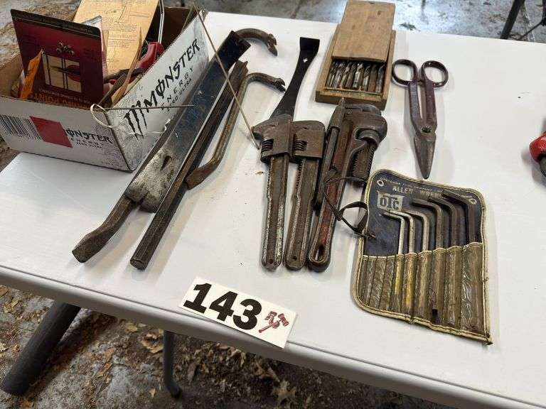 Pipe wrenches, pro bars, drill bits, large Allen wrenches box, cutters