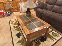 Wood ￼Coffee table with inlaid Tile and two drawers and bear table lamp
