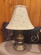 Wood bench with cushion seat, three wicker baskets, three lamps, two throw pillows ￼