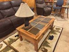 Wood ￼Coffee table with inlaid Tile and two drawers and bear table lamp