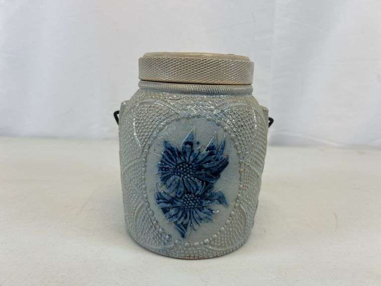 Antique stoneware jar with handle and lid