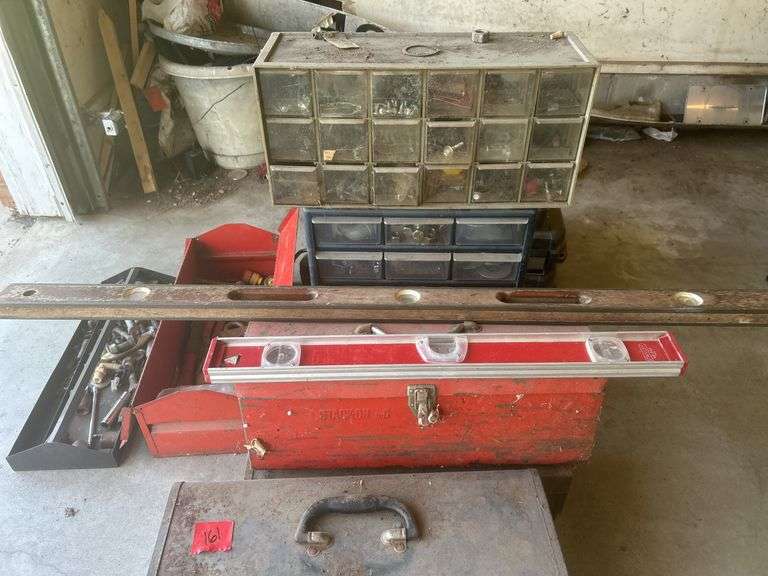 Tool boxes chainsaw levels and drill