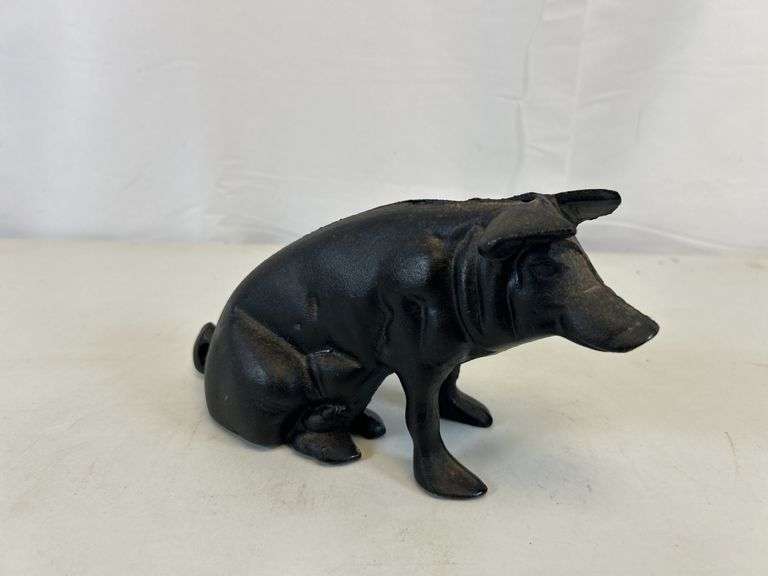 Vintage cast-iron pig door stop