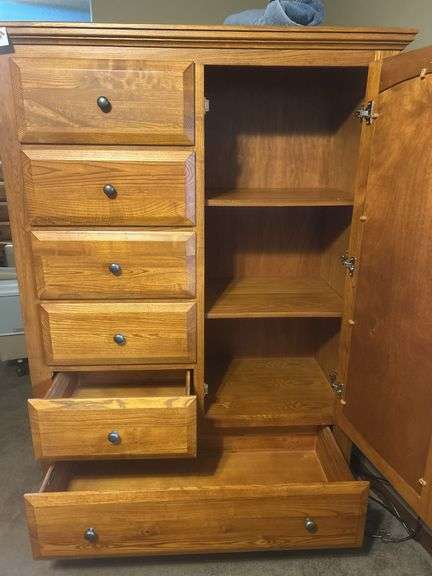 Wooden mirrored armoire