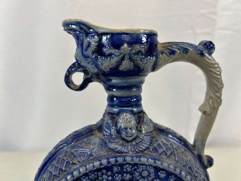 Antique stoneware pitcher/decanter ￼