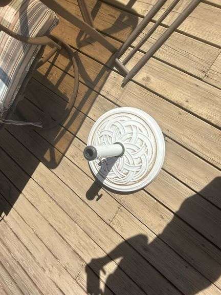 Patio table, chairs, and umbrella