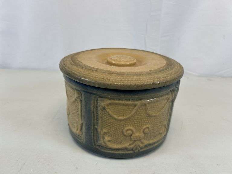 Antique crock with lid
