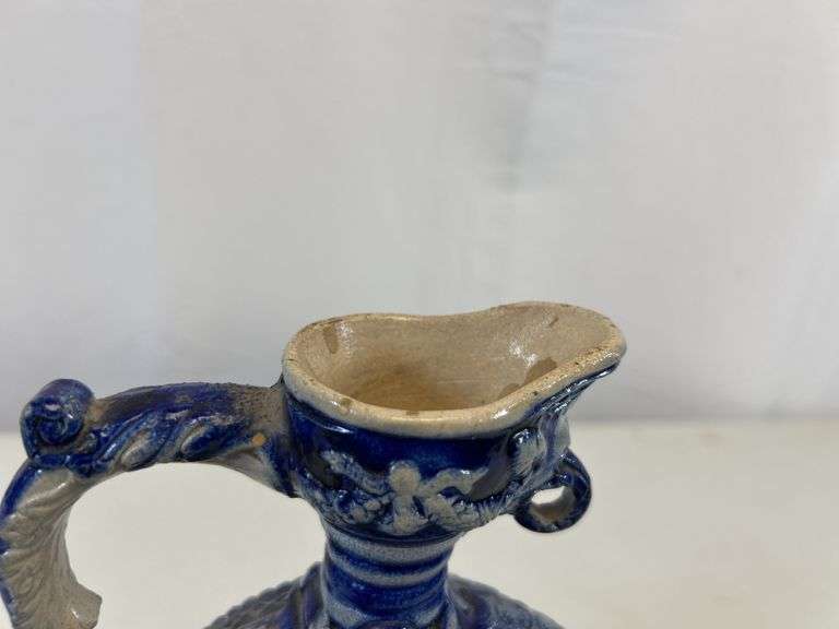 Antique stoneware pitcher/decanter ￼