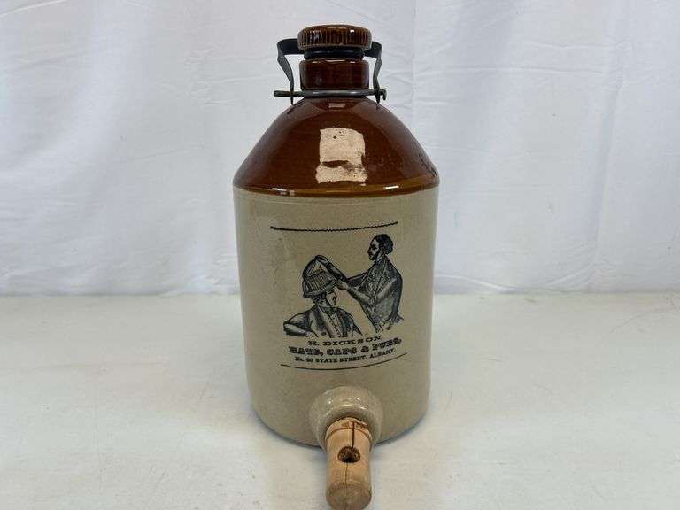 H. Dickson Hats, Caps, & Furs whisky jug