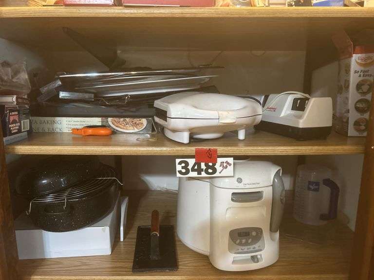 Deep fryer, serving trays, knife, sharpener, and more