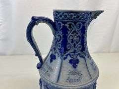 Antique stoneware pitcher ￼