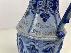 Antique stoneware pitcher ￼