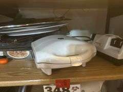Deep fryer, serving trays, knife, sharpener, and more