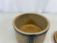 Antique crock with lid