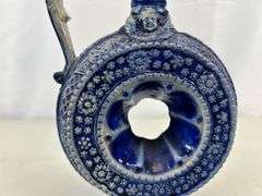 Antique stoneware pitcher/decanter ￼