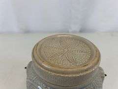 Antique stoneware jar with handle and lid
