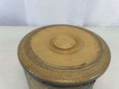Antique crock with lid