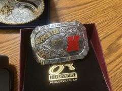 Montana silver Smith-Oregon Trail rodeo belt buckles