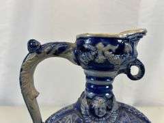 Antique stoneware pitcher/decanter ￼