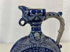 Antique stoneware pitcher/decanter ￼