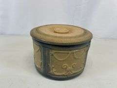 Antique crock with lid