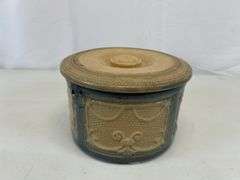 Antique crock with lid