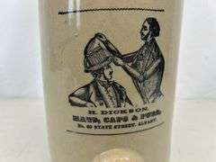 H. Dickson Hats, Caps, & Furs whisky jug