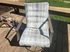 Patio table, chairs, and umbrella