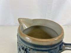 Antique stoneware pitcher ￼