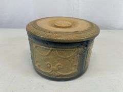 Antique crock with lid